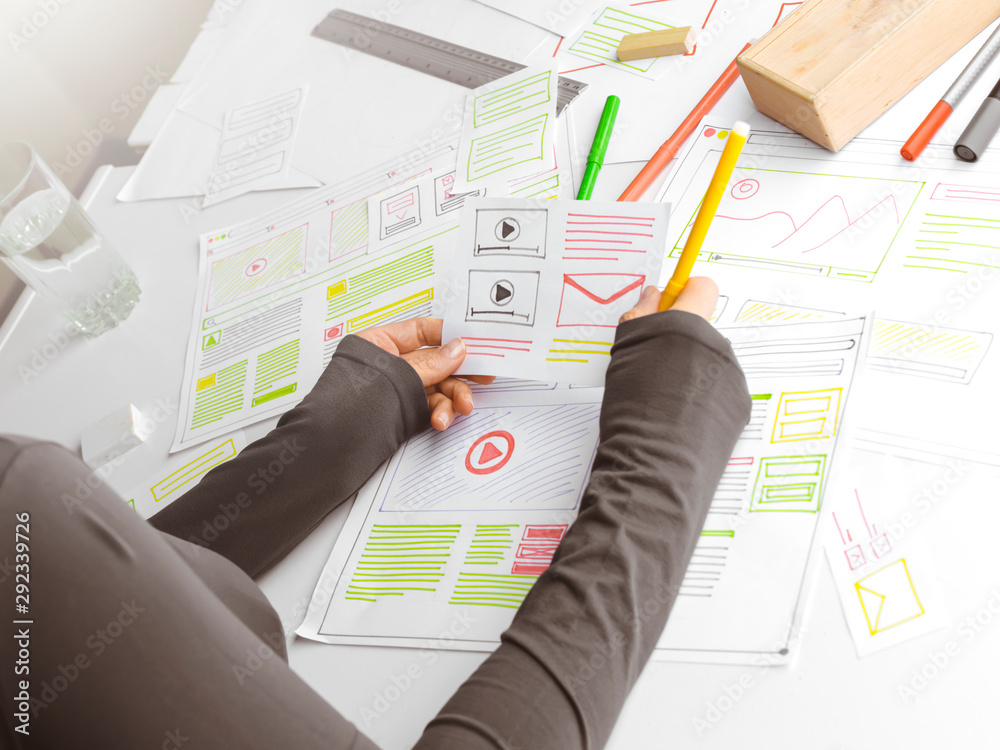 Poster designing web user interfaces for sites or web applications.