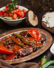 Beef fillet steak cokertme kebab with tomato sauce