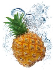 Bubbles forming in blue water after pineapple is dropped into it.