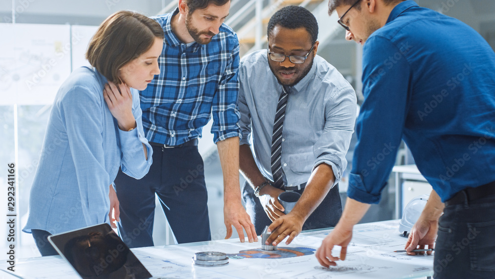 Poster in the industrial engineering facility: diverse group of engineers, technicians, and specialists on 