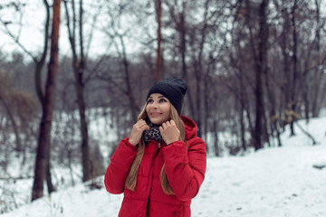 December walk with a young pretty blonde
