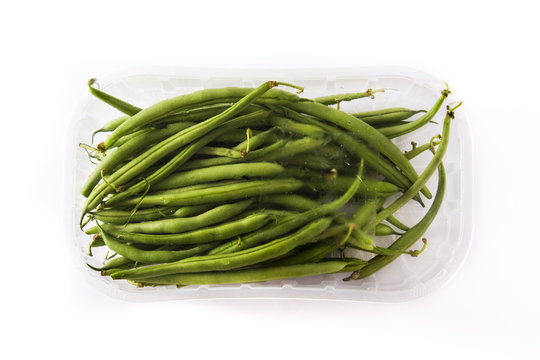 Green beans packaged in plastic isolated on white background