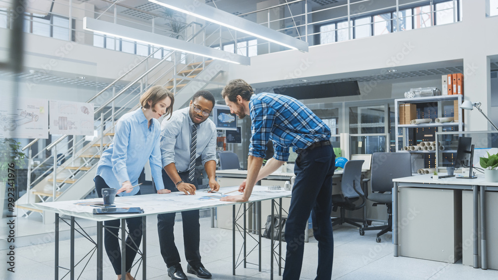 Poster in the industrial engineering facility: two architects and chief engineer, discuss and analyse indus