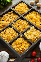 Different types of raw pasta. Italian food. Healthy food background concept.