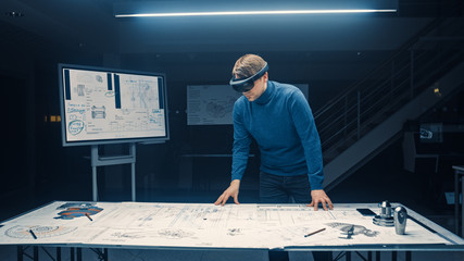 Software Development Engineer Wearing Virtual Reality Headset Gestures and Manipulates Components...