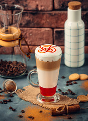 Coffee frappe with milk and red syrup
