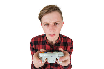 Close up portrait of addicted teenage boy has problems due to video games addiction, looking...