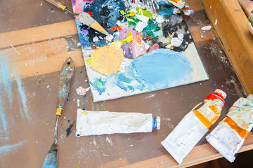 Real work studio of the painter. Man is creating picture. Artist concept. Creative atmosphere....