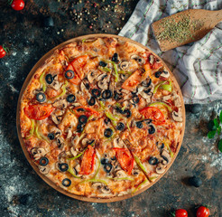 Italian pizza with mushroom, tomato, olive and cheese