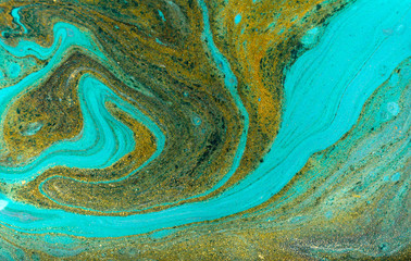 Amazing luxury yellow gold marble background with blue and black layers.