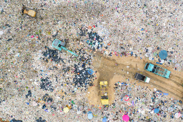 Garbage or waste Mountain or landfill, Aerial view garbage trucks unload garbage to a landfill....