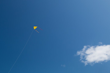 Colorful kite on a blue sky.