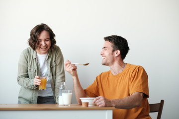 couple having breakfast in the morning at home