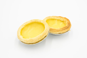 Hong Kong baked pastry 2 fresh tarts close-up isolated on a white background