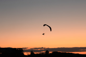 Photo of the hang glider that flying in the sky