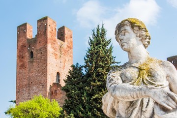 Fototapeta na wymiar Statue and Tower in Castelfranco Veneto