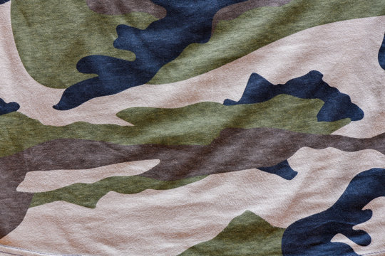 Camouflage cloth surface. Abstract background and texture.