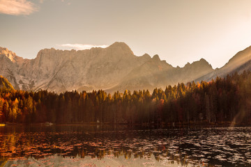 Colorful autumn foliage at the alpine lake