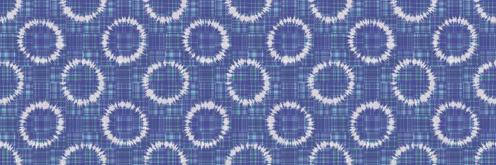 Polka dot ring tie dye seamless border pattern. Hand dyed effect wax batik circle. Spliced streaks of gradient dye gingham check background. Bleach resist blended texture geo effect ribbon trim edge