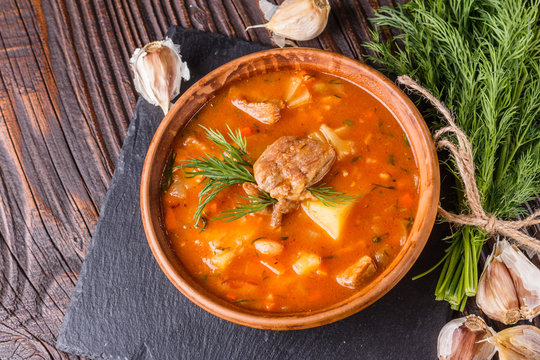 Chanahi a traditional Georgian meat stew in a bowl on stoyn board