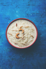 Rice Kheer or Firni or Chawal ki Khir is a pudding from Indian subcontinent, made by boiling milk ,sugar and Rice. Served in a bowl