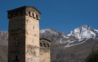 Stone towers against  mountains landscape