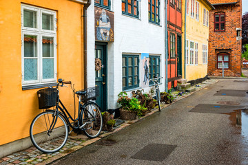 Fototapeta na wymiar Street view with colorful buildings in Helsingor, Denmark
