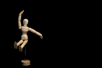 wooden dummy with arms and legs on white background