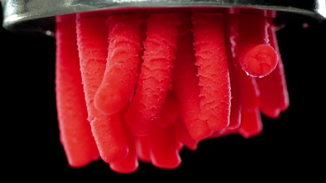 Meat grinder grinds the abstract meat.