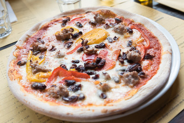 Neapolitan pizza sausage with peppers and mushrooms