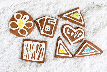 Christmas cookies for Santa Claus on a fluffy white carpet background