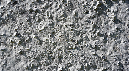 Concrete wall texture like moon surface