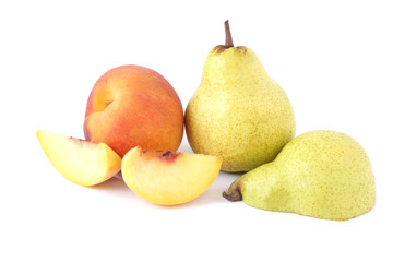 Ripe green pear fruit and peach fruit isolated on white background