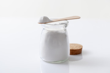 Chemical powder in a jar. Background image. Copyspace text