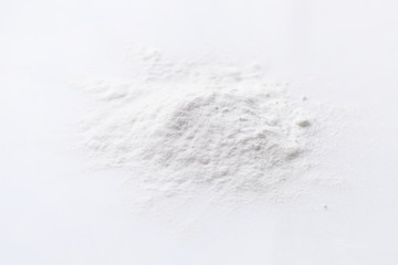 A pile of stabilizer powder on a white background.