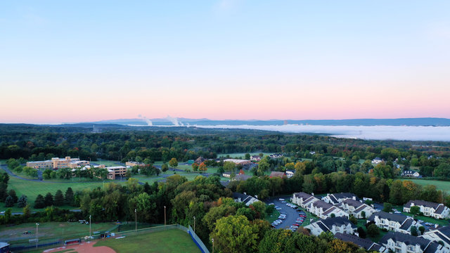fog filled hudson valley with Albany NY in the distance