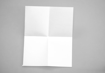 blank paper isolated on gray background. Poster mock-ups paper, white paper portrait A4. brochure magazine isolated, use banners products business cards to showcase your