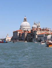 Madonna della Salute Church and boats in Venice Italy