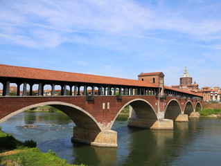 Fototapeta na wymiar Ticino River and the old Covered Bridge in Pavia Town