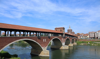 Fototapeta na wymiar view of Old Bridge in Pavia City in Italy and the Ticino River
