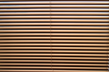 Obraz premium brown window blinds close up