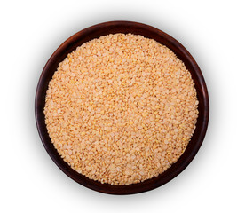 Urad dal or split black gram In A Wooden Bowl 