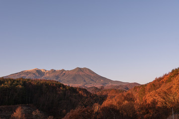 Ontake mountain is dyed morning glow in early in the morning. Autumn in Japan.