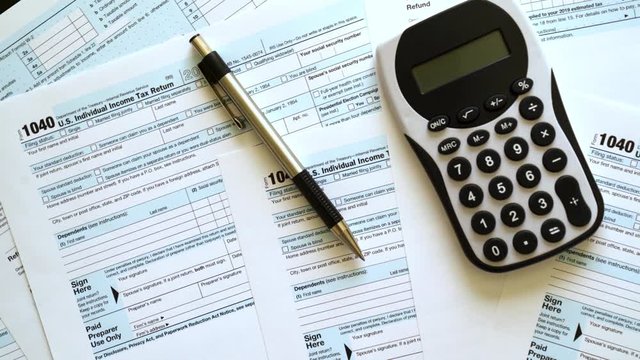 Income Tax Return Refund Forms 1040 pan shot
