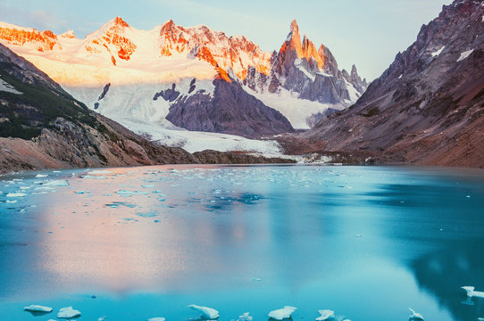 Amazing sunrise view of Cerro Torre mountain by the lake. Los Glaciares National park. Argentina