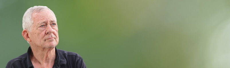 Senior portrait on green background