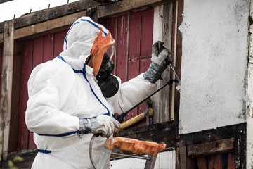 team responsible for removing asbestos on a construction site - 292387549