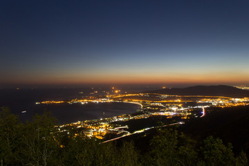Amazing night scenic view of Gelendzhik resort city. Vacation background.
