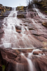 Scenic, colorful, powerful Monk's jump waterfall on Old mountain, the tallest in Serbia, streaming down the dark, rocky cliff