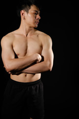 Naklejka premium athletic muscular bodybuilder man with naked torso six pack abs. fitness workout concept